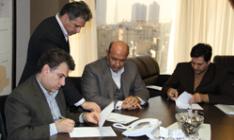 امضای قرارداد عاملیت صندوق توسعه ملی و بانک پارسیان